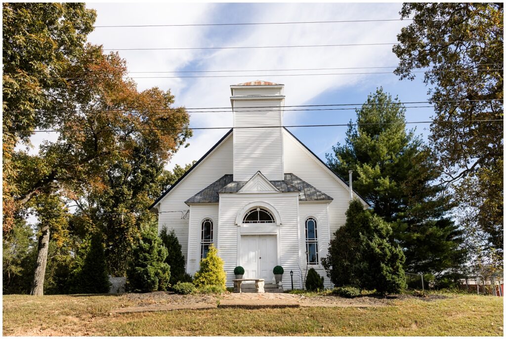 Magnolia Country Chapel exterior surrounded by colorful fall leaves
